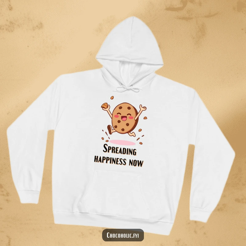 Funny hoodie featuring a kawaii chocolate cookie character leaping with joy and scattering cookie crumbs, offering warmth and cheer.